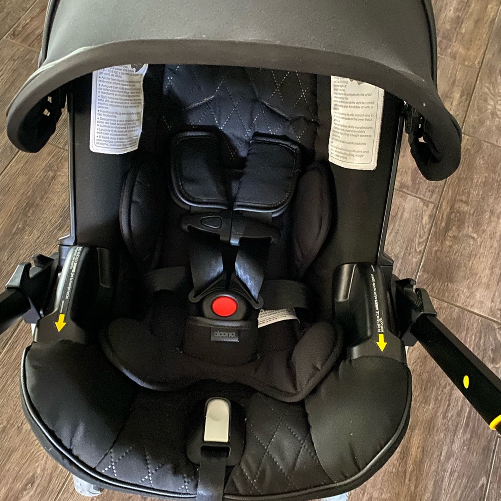 Midnight black doona stroller.